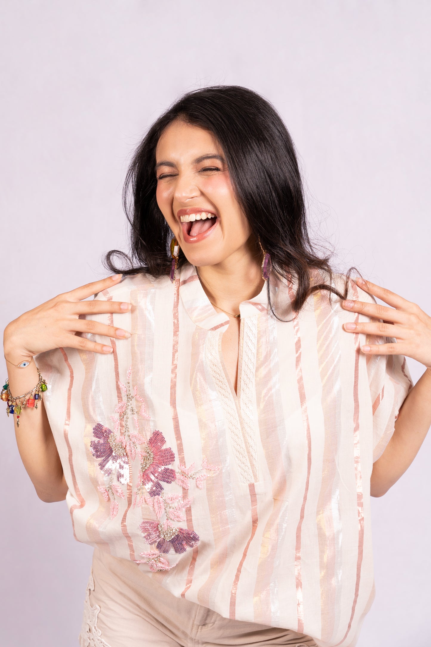 Peach and silver floral top
