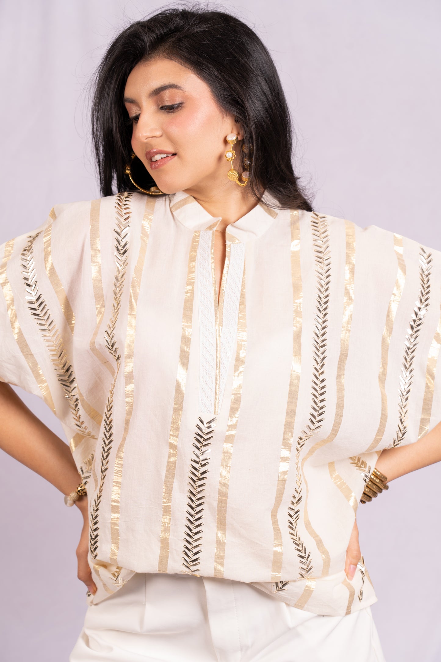 Gold and silver Striped top