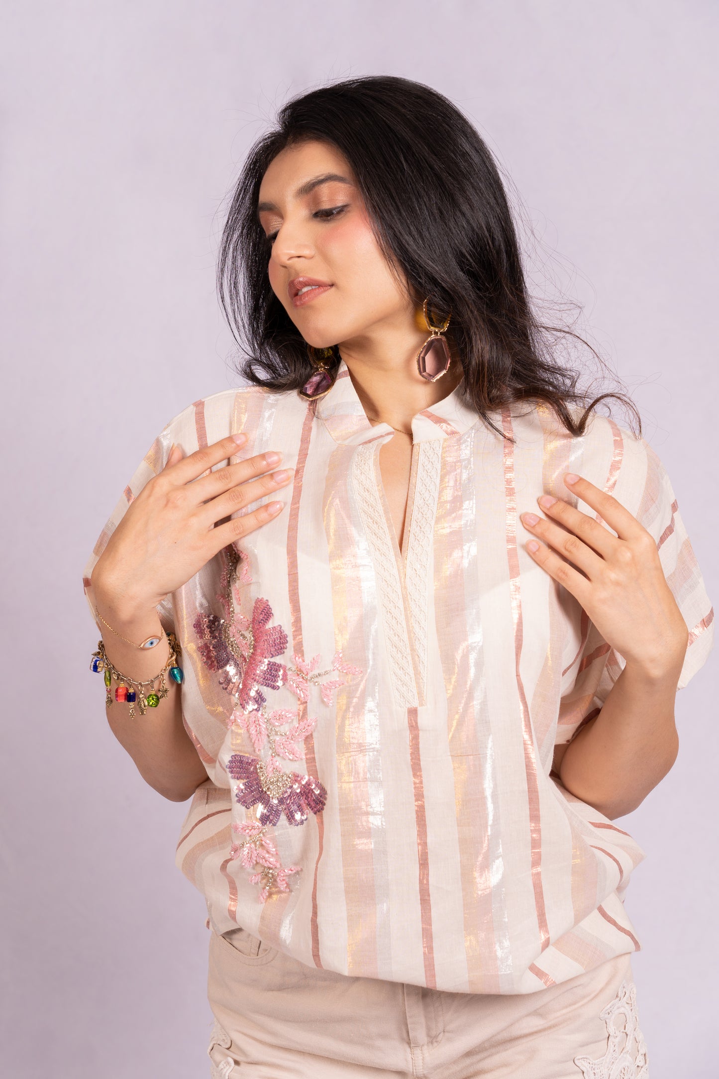 Peach and silver floral top