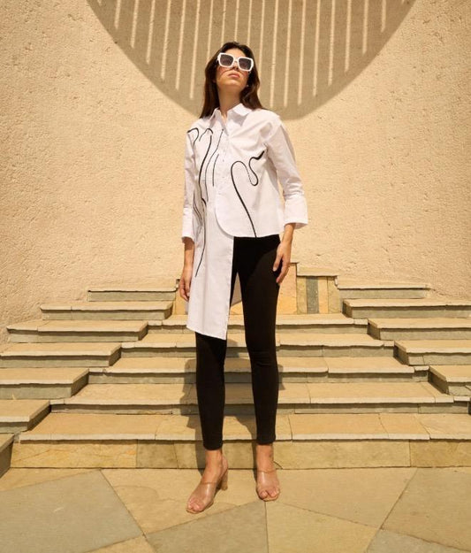 White and black high low shirt