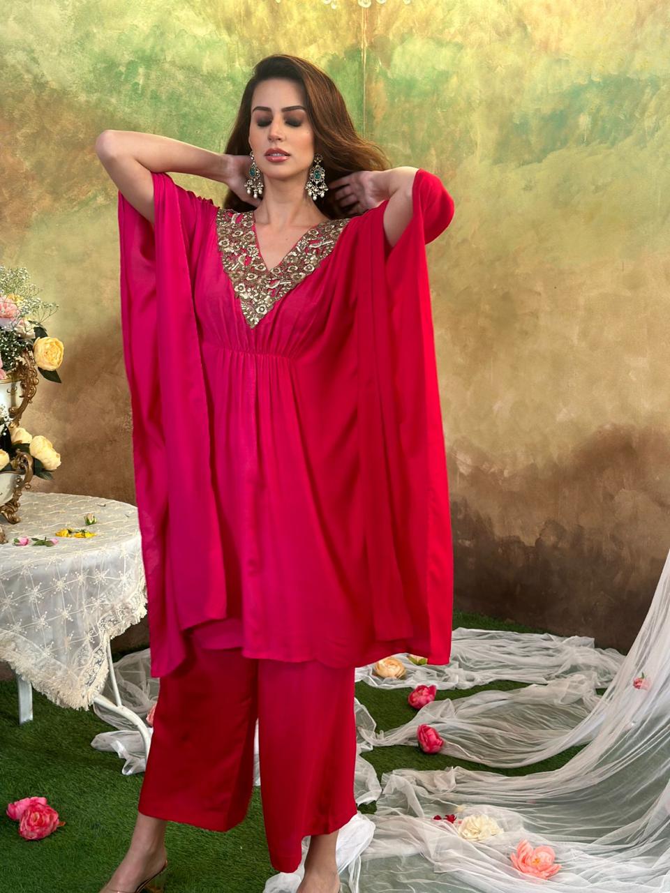 Red embroidered top with straight pants