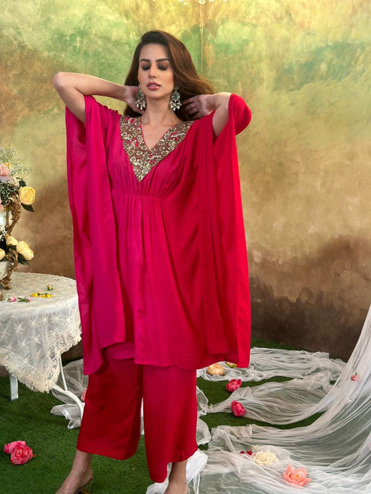 Red embroidered top with straight pants